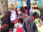 Tim PHP2D Undhar Fasilitasi Taman Baca di Kelurahan Nelayan Indah