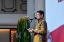 Gubernur Sumatera Utara Muhammad Bobby Afif Nasution memberikan sambutan dalam acara pengukuhan Kepala OJK Provinsi Sumut Triyoga Laksito di Aula Raja Inal Siregar Kantor Gubernur Sumut, Jumat (31/7/2026), dengan meminta OJK memperkuat ekonomi syariah dan menyesuaikan layanan sesuai karakteristik daerah. Foto: Ist.