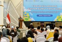 Pj Sekdaprov Sumut Timur Tumanggor menyampaikan sambutan sekaligus komitmen Pemprov Sumut membebaskan UMKM dari jeratan rentenir dan sistem ijon dalam pembukaan Forum Kolaborasi Ekonomi dan Keuangan Syariah Sumut 2026 di Aula Kuala Deli, Kantor Perwakilan BI Sumut, Medan, Kamis (27/8/2026). Foto: Ist.
