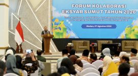 Pj Sekdaprov Sumut Timur Tumanggor menyampaikan sambutan sekaligus komitmen Pemprov Sumut membebaskan UMKM dari jeratan rentenir dan sistem ijon dalam pembukaan Forum Kolaborasi Ekonomi dan Keuangan Syariah Sumut 2026 di Aula Kuala Deli, Kantor Perwakilan BI Sumut, Medan, Kamis (27/8/2026). Foto: Ist.