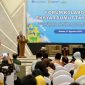 Pj Sekdaprov Sumut Timur Tumanggor menyampaikan sambutan sekaligus komitmen Pemprov Sumut membebaskan UMKM dari jeratan rentenir dan sistem ijon dalam pembukaan Forum Kolaborasi Ekonomi dan Keuangan Syariah Sumut 2026 di Aula Kuala Deli, Kantor Perwakilan BI Sumut, Medan, Kamis (27/8/2026). Foto: Ist.