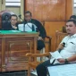Mantan Kepala Dinas Pendidikan Kabupaten Langkat, Saipul Abdi, tampak memberikan keterangan di hadapan majelis hakim dalam sidang kasus korupsi proyek pengadaan smartboard di Pengadilan Negeri Medan, Senin (3/8/2026). Foto: Ist.