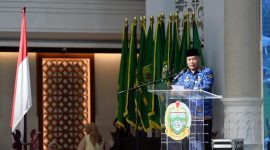Pj Sekdaprov Sumut Timur Tumanggor memberi sambutan pada kegiatan rekonstruksi dan rehabilitasi arsip ASN terdampak bencana di Aula Raja Inal Siregar, Kantor Gubernur Sumut, Medan, Selasa (29/9/2026). Foto: Ist.