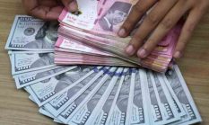 Rupiah Tembus Rp18.000 per Dolar AS, BI Lakukan Triple Intervention Jaga Stabilitas